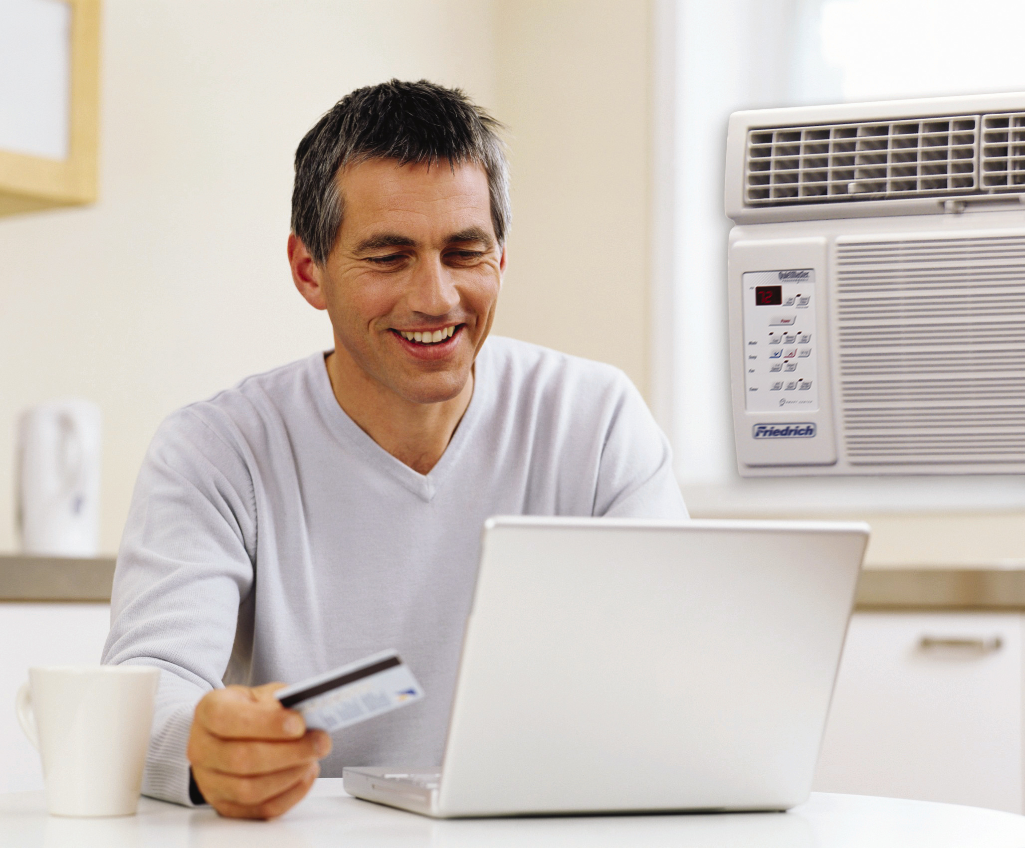 Man Paying Bill Online with Credit Card