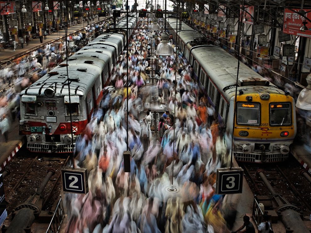 People Crowded between Mumbai Local Trains