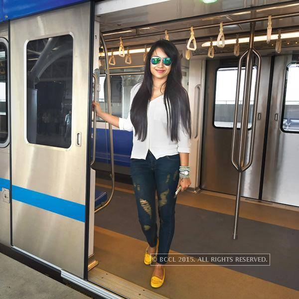 Trisha at doors of chennai Metro train